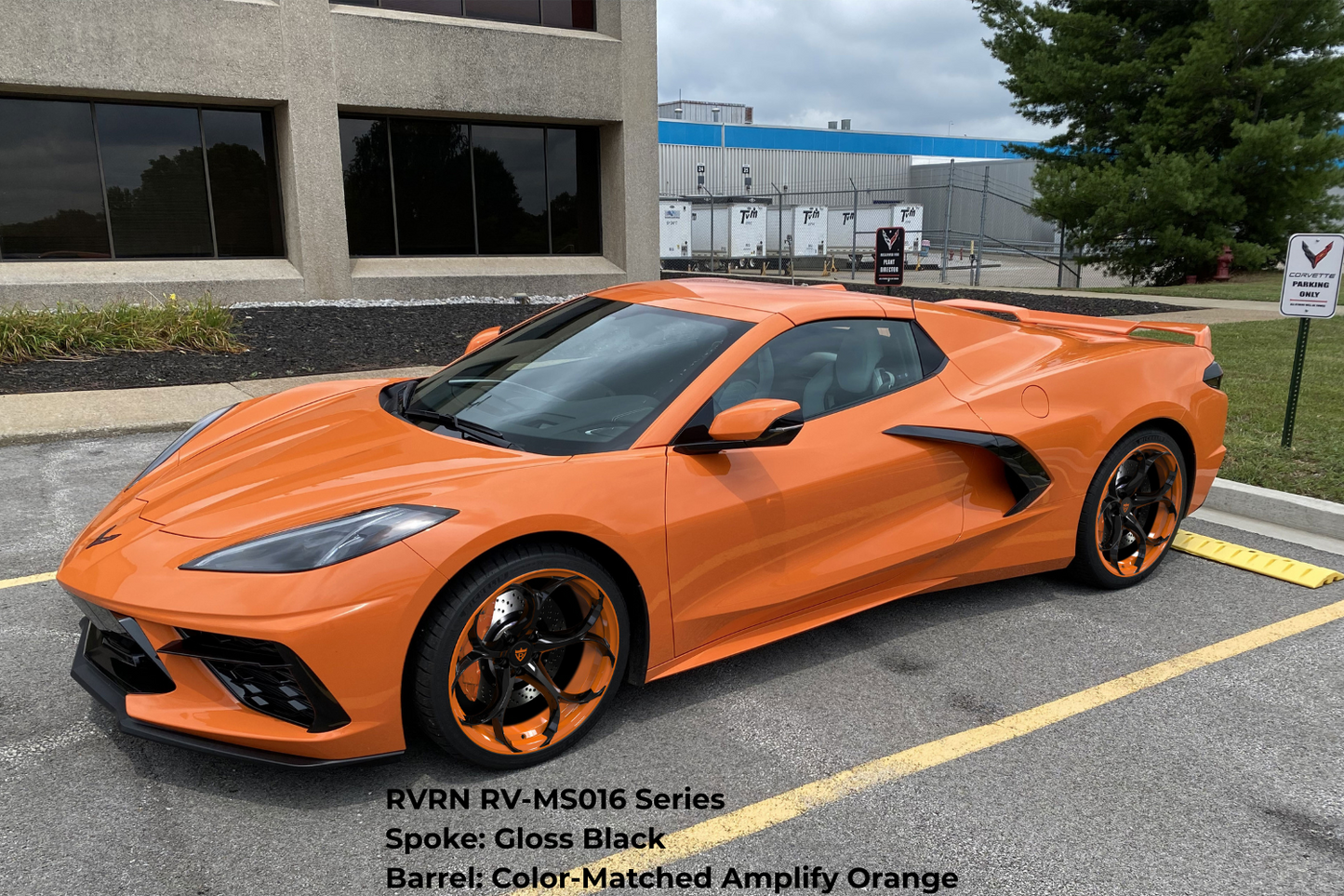 2021 Corvette C8 Stingray with a set of color matched amplify orange and black custom wheels with OEM size.