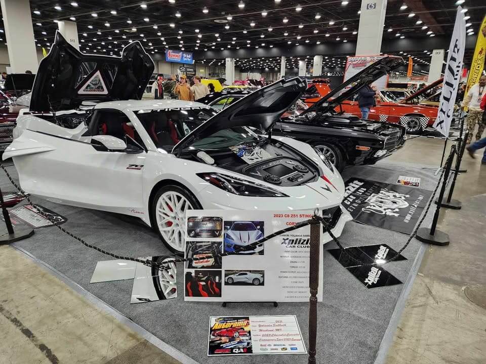 Sleek white forged wheels on a Corvette C8 Stingray, showcasing performance