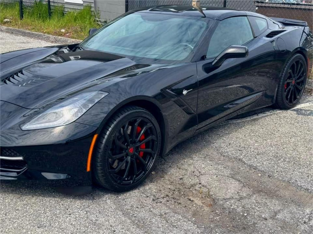 A sleek black Corvette C7 on RVRN gloss black custom forged wheels in 19x8.5/20x10 oem specs