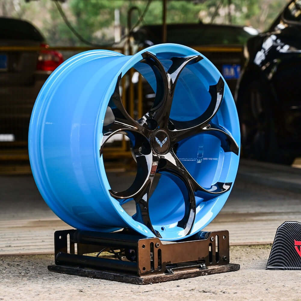 Rapid Blue forged wheels with a polished aluminum lip on Corvette C8 Z51