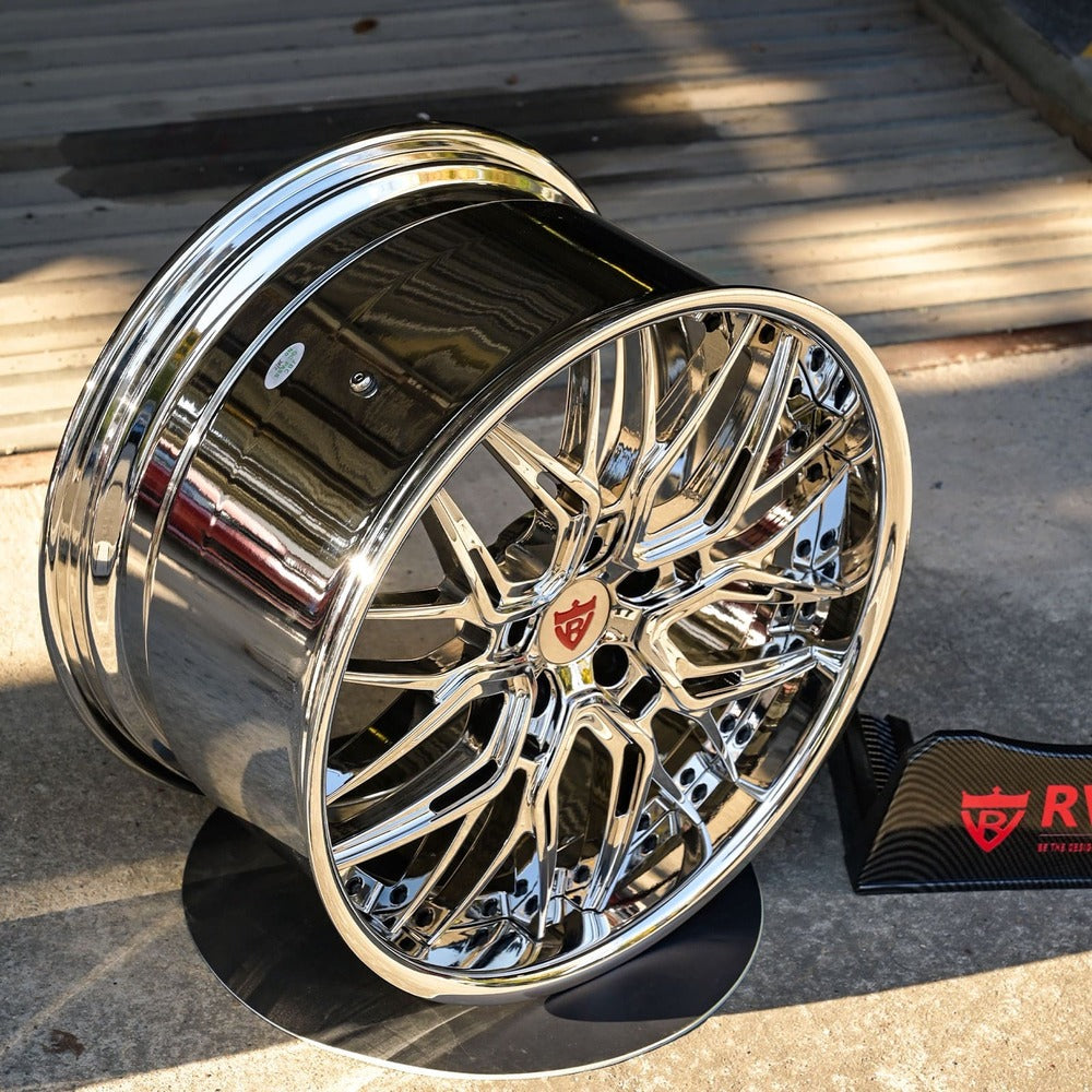 Custom forged chrome wheel for Corvette C8, showcasing deep dish design and high shine finish.