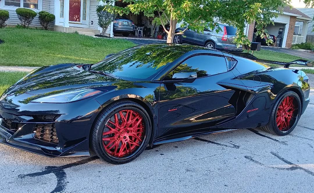 Corvette Red & Black Custom Forged Wheels Collection featuring RVRN Wheels on a sleek black Corvette.