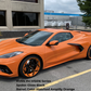 2021 Corvette C8 Stingray with a set of color matched amplify orange and black custom wheels with OEM size. 