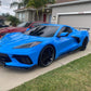 Rapid Blue Corvette C8 Z51 with a set of custom forged 2-piece wheels in gloss black face, gunmetal lip and rapid blue screws-customize your own unique rims