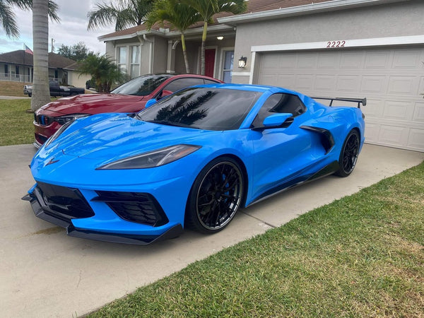 Rapid Blue Corvette C8 Z51 with a set of custom forged 2-piece wheels in gloss black face, gunmetal lip and rapid blue screws-customize your own unique rims