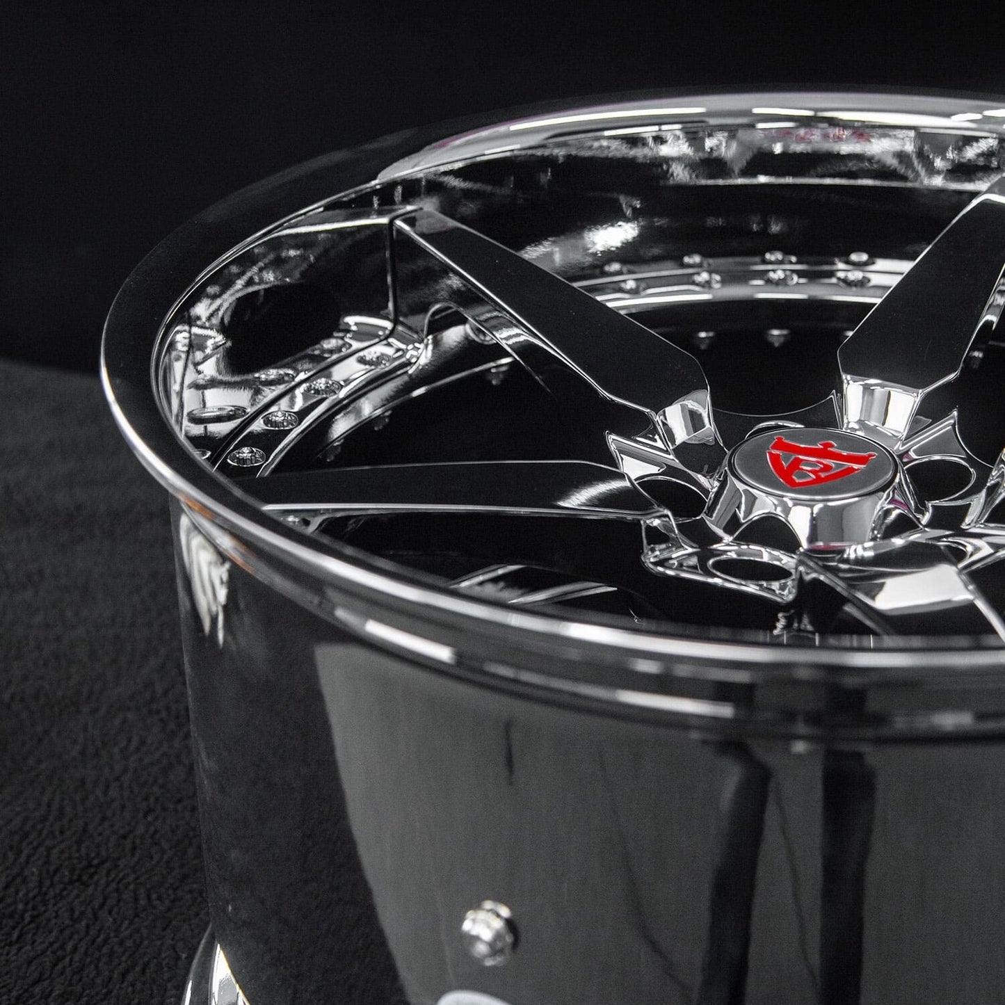 Depth angle showing staggered 20x10 and 21x13 chrome forged wheels for 2026 Corvette E-Ray.