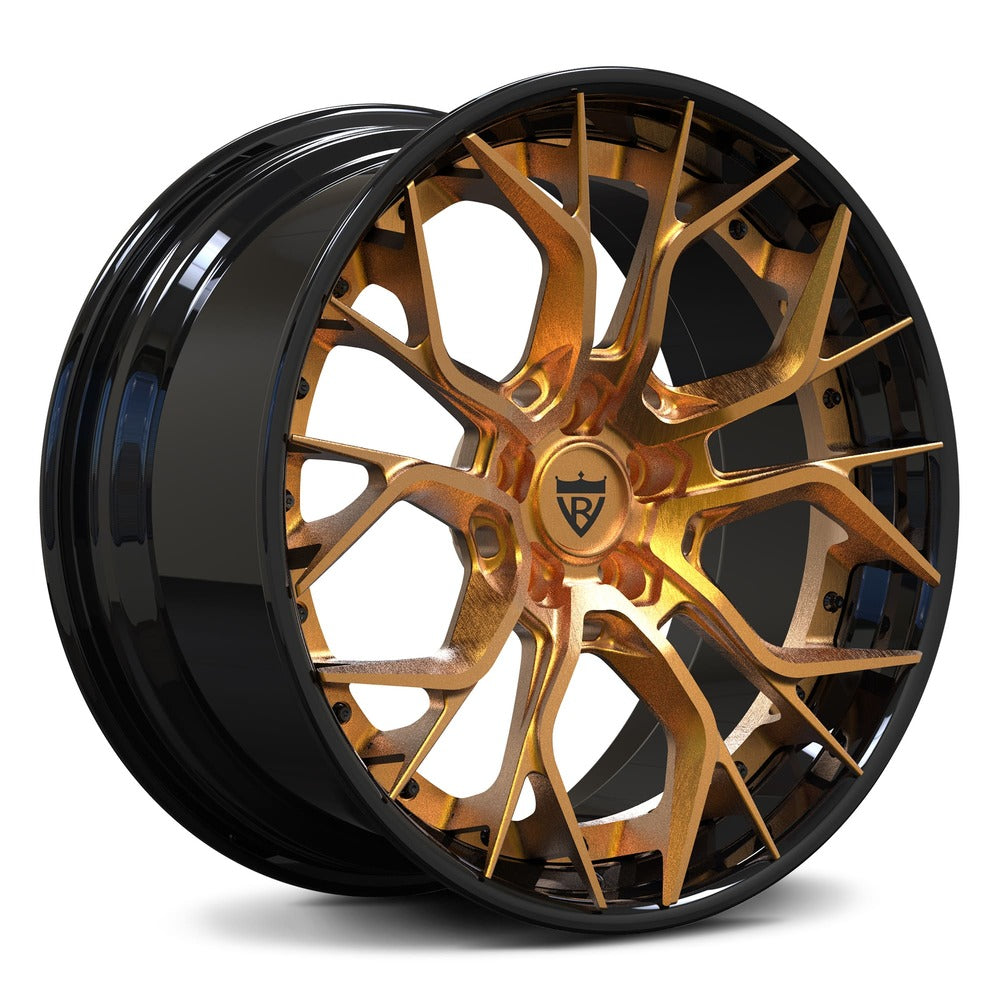 Custom copper and black wheels for C7 Corvette displayed in a showroom, perfect for those looking to upgrade their vette's aesthetics.