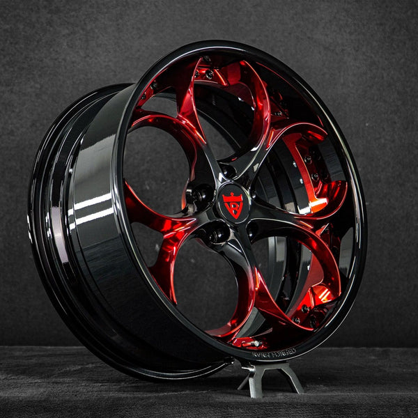 Red and black forged wheels for Corvette C8 close-up view