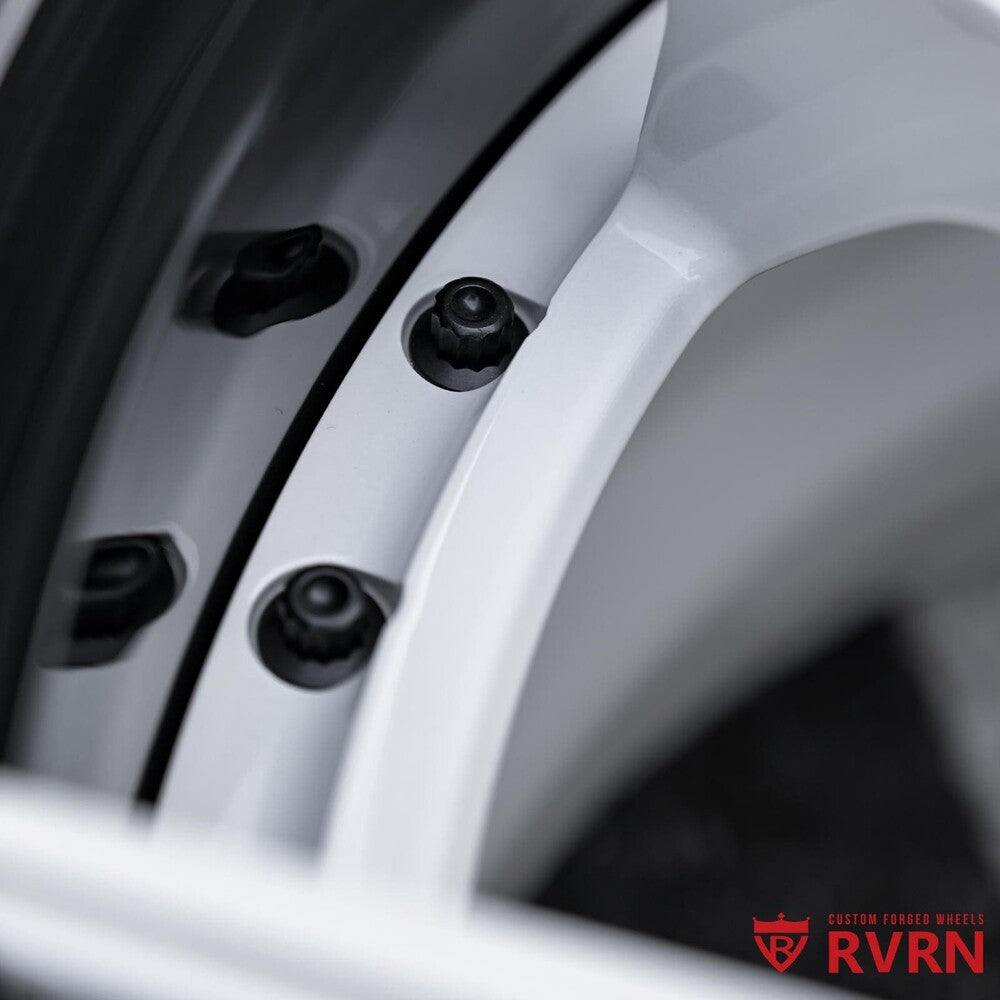 Gloss black barrel and ivory white spoke combination on RVRN DS74 wheel.