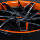 Detail of orange and black forged Corvette Z51 wheels – RV-DS74 center cap