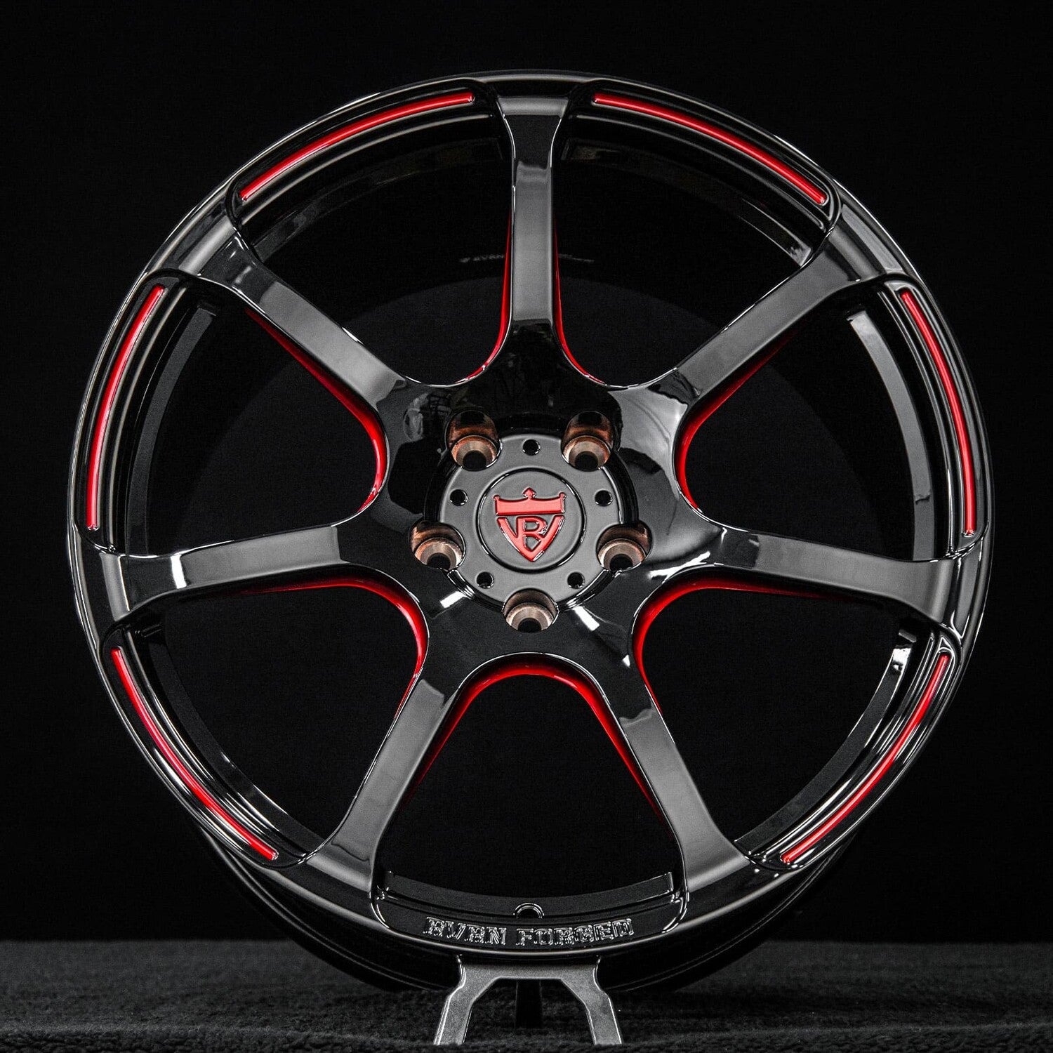 Close-up of transparent red engraving on gloss black MH092 monoblock wheel for Corvette C8 Z51.