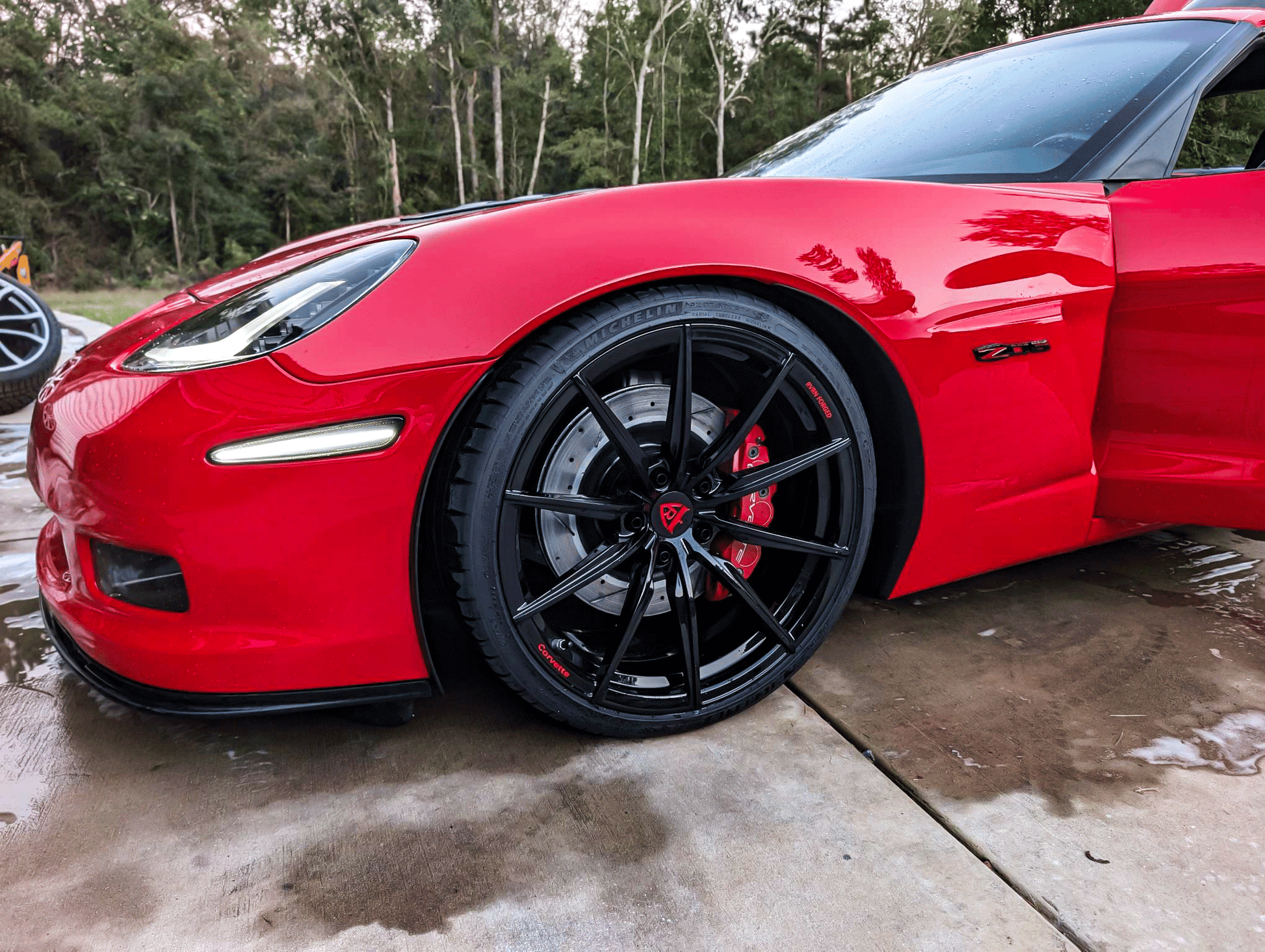 A torch red Corvette C7 Z06 on a set of RVRN custom forged super concave rims RV-MJ02 Series with gloss black finish, 19x10/20x12 setup 