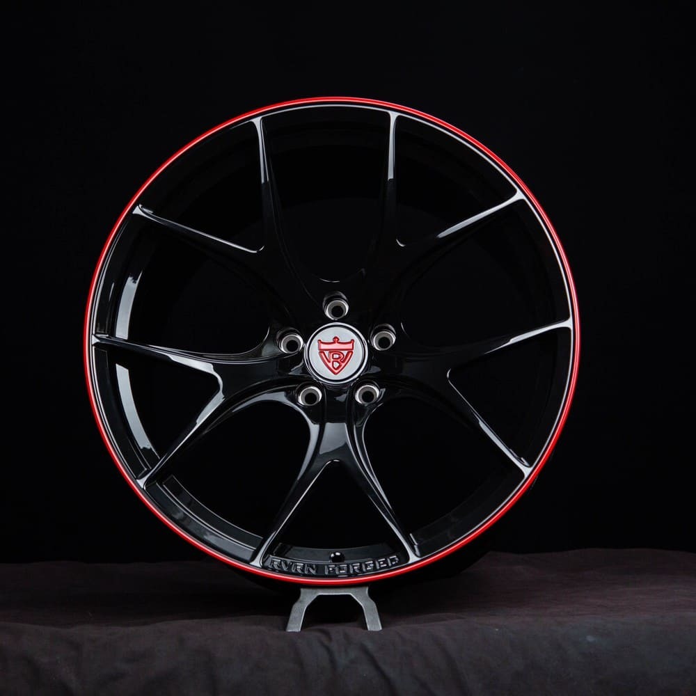 Front view of RV-MR05 Corvette C8 Rims in gloss black and RVRN red