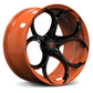 High-resolution rendering of aftermarket orange wheels on Corvette C8