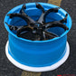 Full view of Rapid Blue custom wheels on a Corvette C8 Stingray