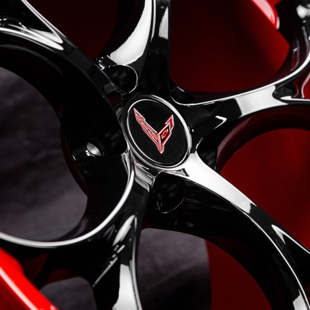	Corvette C8 Z51 forged wheel close-up showing red barrel and black spoke