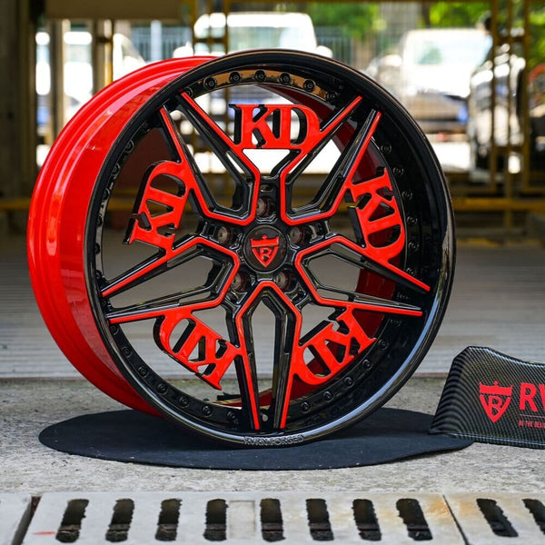 	Front view of RB-01 black and red forged wheels on C8 Corvette Z51