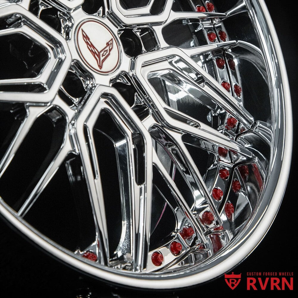 Close-up of RVRN RV-T081 forged wheel spokes – chrome finish with RVRN red screws