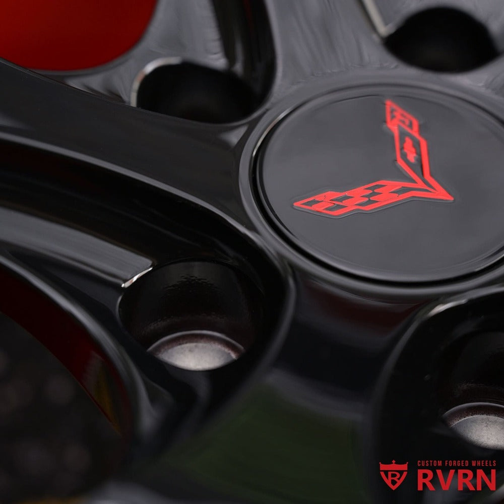 	Detailed shot of black and red forged RV-MR05 wheel design