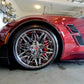 Aftermarket forged and chrome deep dish wheels for a red 2017 Corvette C7 Grand Sport models